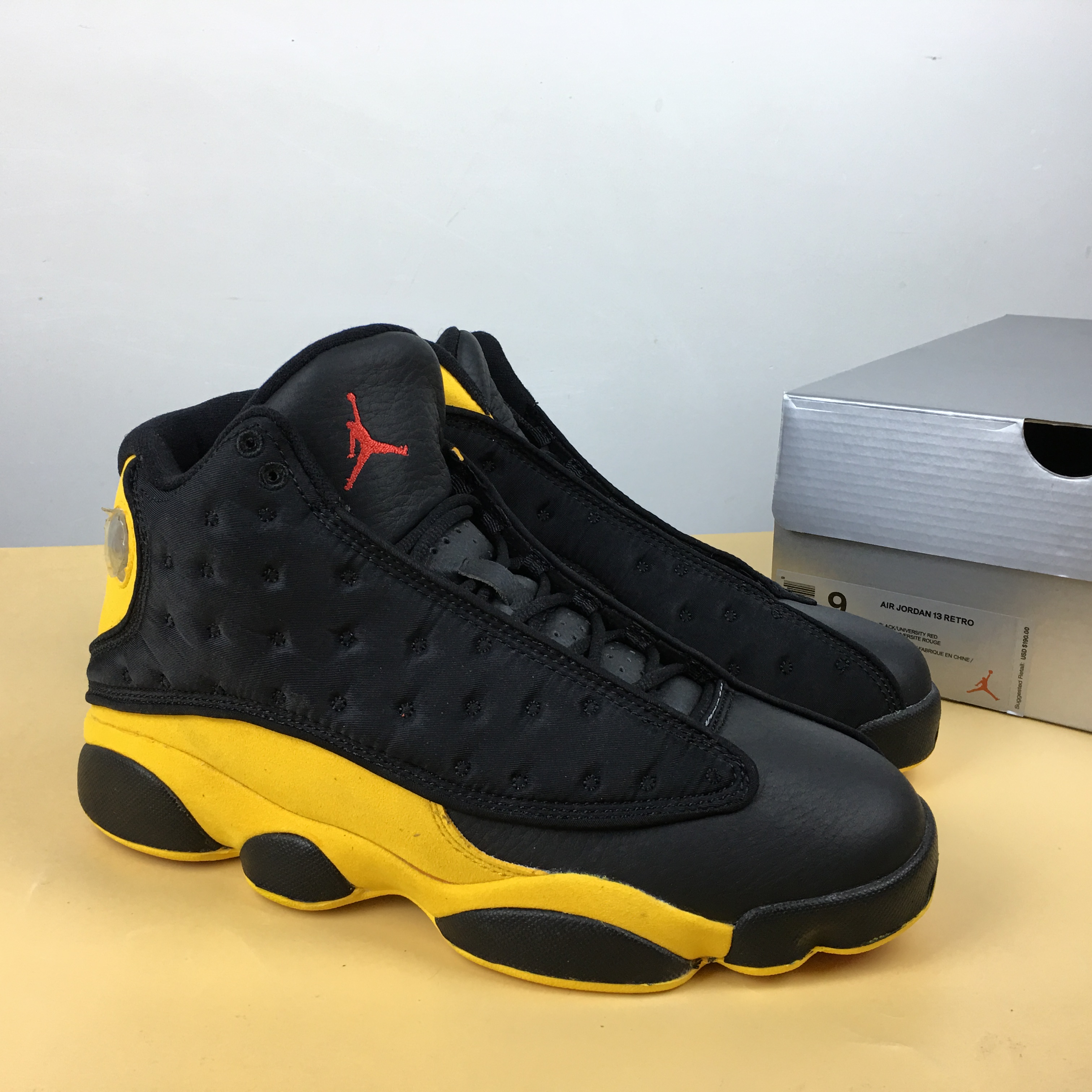 jordan 13 black and yellow